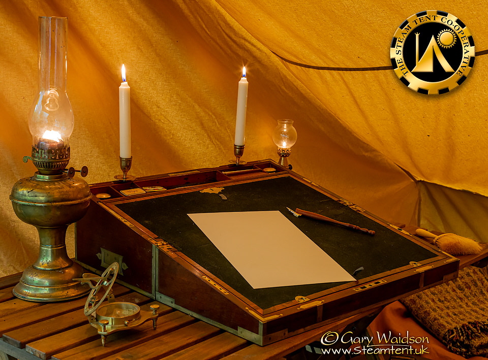 Writing slope in use at Bushmoot 2021 - The Steam Tent Co-operative.  Gary Waidson - www.Steamtent.uk